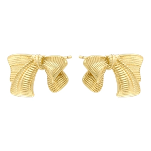 Macro shot of gold-plated bow earrings with textured surface and metallic luster