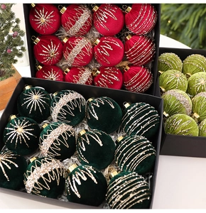 Detail of velvet Christmas balls with glitter stripes and star patterns in 12-piece sets