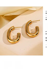 Detailed view of polished 18K gold plated stainless steel C-shaped chunky hoop earrings