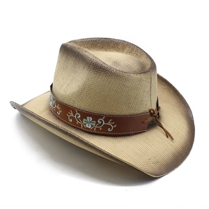 Détail d'un chapeau de paille cowboy beige avec bord dégradé brun et bandeau floral bleu