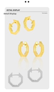 Close-up of S925 sterling silver geometric hoop earrings with vertical ribbed texture