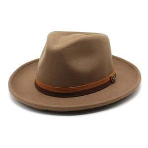 Detailed close-up of brown wool fedora with two-tone ribbon and metal logo emblem