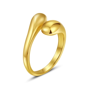 Detail shot of the polished golden waterdrop-shaped open ring with sleek adjustable curves