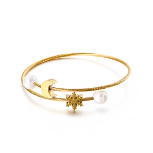Gold stainless steel twisted wire bracelet with moon, snowflake charms and white pearls