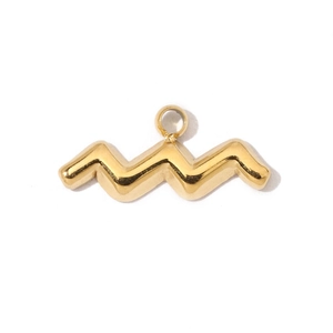 Detailed view of Aquarius zodiac sign pendant in 18K gold plated stainless steel