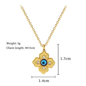 Detailed view of gold clover necklace with blue evil eye pendant and size specifications