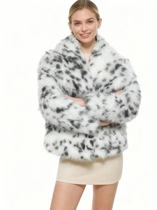 Detailed close-up showing thick leopard print faux fur texture and black white spots