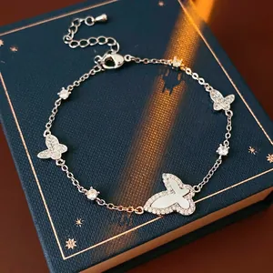 Elegant silver butterfly bracelet with mother of pearl and sparkling zircon stones