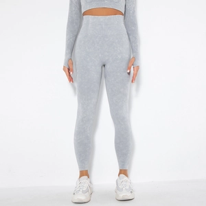 Detail of gray seamless high-waist yoga set with thumbholes and acid-wash texture