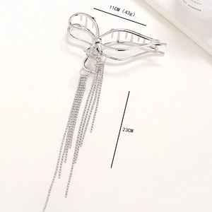 Large silver metal shark clip with long rhinestone tassels and size measurements