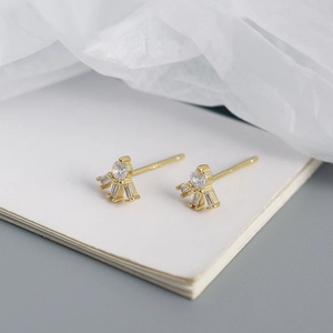 Detail of s925 silver earrings with square and round zircon crystals on white card