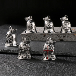 Detailed close-up of six titanium steel biker bell pendants with vintage masonic and cross symbols