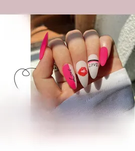 Detail of pink almond-shaped press-on nails with red lip motifs and love lettering