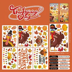 Detail view of 6-sheet Thanksgiving window clings with turkey and maple leaf motifs