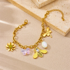 Gold-plated stainless steel charm bracelet with sunflower, butterfly, and bee charms