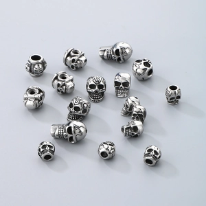 DIY stainless steel skull charm beads with vintage oxidation for Halloween jewelry