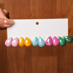 Set of 5 pairs of teardrop earrings with vibrant metallic laser finish on display card
