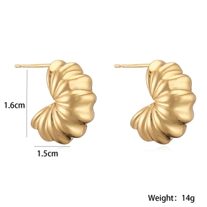 Detail shot of gold-plated croissant earrings with dimensions 1.6cm by 1.5cm and 14g weight