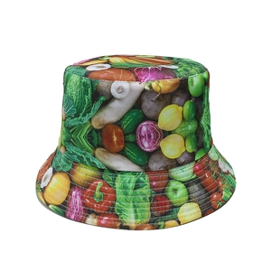 Detail shot of a bucket hat featuring vibrant vegetable prints and smooth stitching