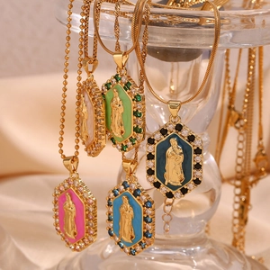 Detailed close-up of 18K gold-plated Virgin Mary pendants with colorful zircon borders