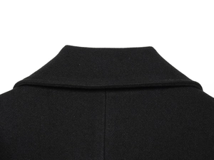 Close-up detail of the black wool blend coat collar showing fine fabric texture and stitching