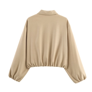 Vue arrière d'une veste bouffante kaki avec ourlet élastique et manches longues