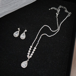 Elegant silver teardrop necklace and earrings set with white cubic zirconia in black gift box