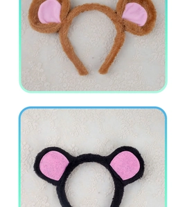 Detailed close-up of plush mouse ears headband showing soft brown and black fur textures