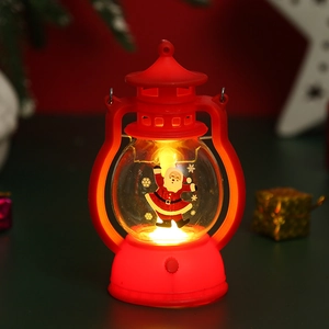 Macro detail of red vintage LED Christmas lantern with Santa Claus and warm light