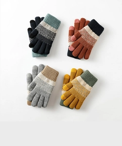 Knitted gloves in multiple colors with touchscreen thumb and textured winter weave pattern