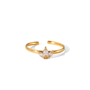 Detail of adjustable gold ring featuring a three-petal leaf design with marquise crystals