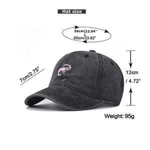 Detailed view of washed grey baseball cap with pink shrimp embroidery and size dimensions