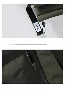 Detail der dunkeloliven Outdoor-Weste mit Berg-Stickerei-Etikett und Reißverschluss-Struktur