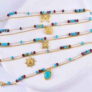 French vintage beaded bracelet set with bohemian heart, bow, and sunflower charms