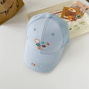 Close-up of light blue kids baseball cap with breathable mesh and cute fish embroidery