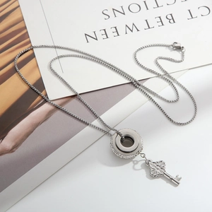 Silver stainless steel long necklace with rhinestone circle and flower key pendant