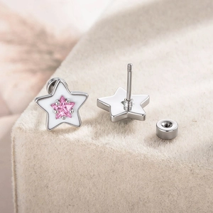 Star shaped stud earrings with pink zircon stone and white enamel in silver steel