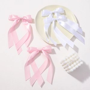 Double-layered satin ribbon bow hair clips in pink and white for girls princess style