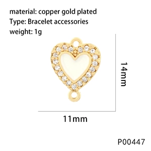 Detail view of 18K gold plated copper heart pendant with zircon inlay, 14mm size