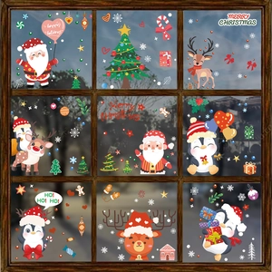 Christmas window decals with Santa, reindeer, and snowflakes on wooden window background