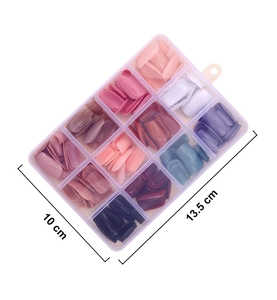 Clear storage box with 12 colors of solid glossy press-on nails measuring 13.5x10 cm