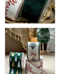 Close-up of velvet Christmas ribbon with Merry and Joy prints and golden edge details