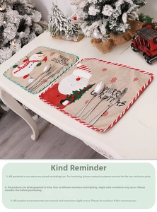 Close-up of embroidered Christmas placemats with Santa and Snowman designs and cutlery