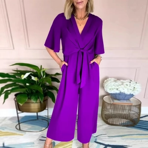 Short sleeve purple V-neck romper for women with waist tie and wide leg design