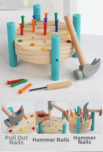 Close-up of wooden pounding toy set showing prying, punching, and hammering functions
