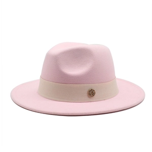 Detail of pink wool fedora with beige grosgrain ribbon and golden M metal buckle