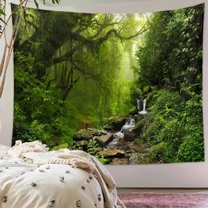 Detail of forest waterfall tapestry hanging as a bedroom wall decoration backdrop