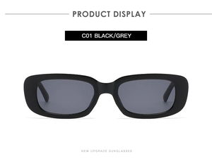 Detail view of model C01 narrow rectangular sunglasses with black frame and grey lenses