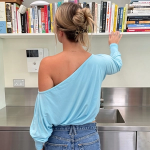 Women's light blue off-shoulder long sleeve top with slim fit and ribbed texture