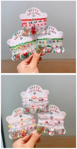 Detailed view of colorful Christmas beaded bracelets with festive Santa and elk charms